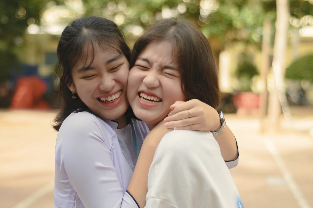 Friends hugging each other