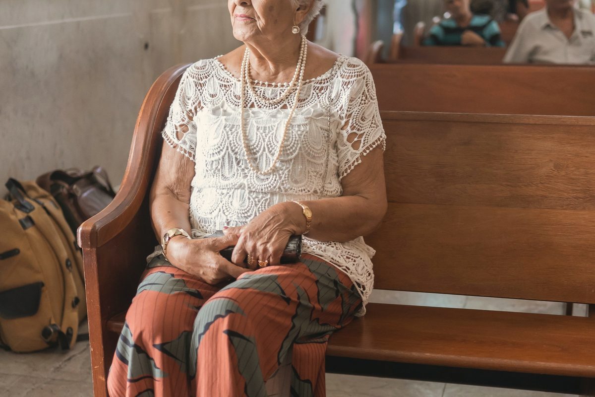 Woman sitting in church