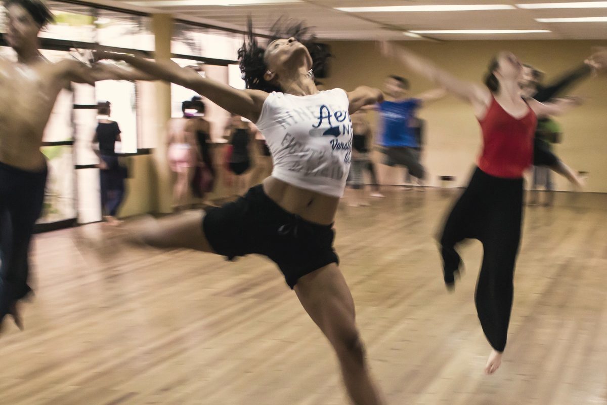 People dancing together in a studio class