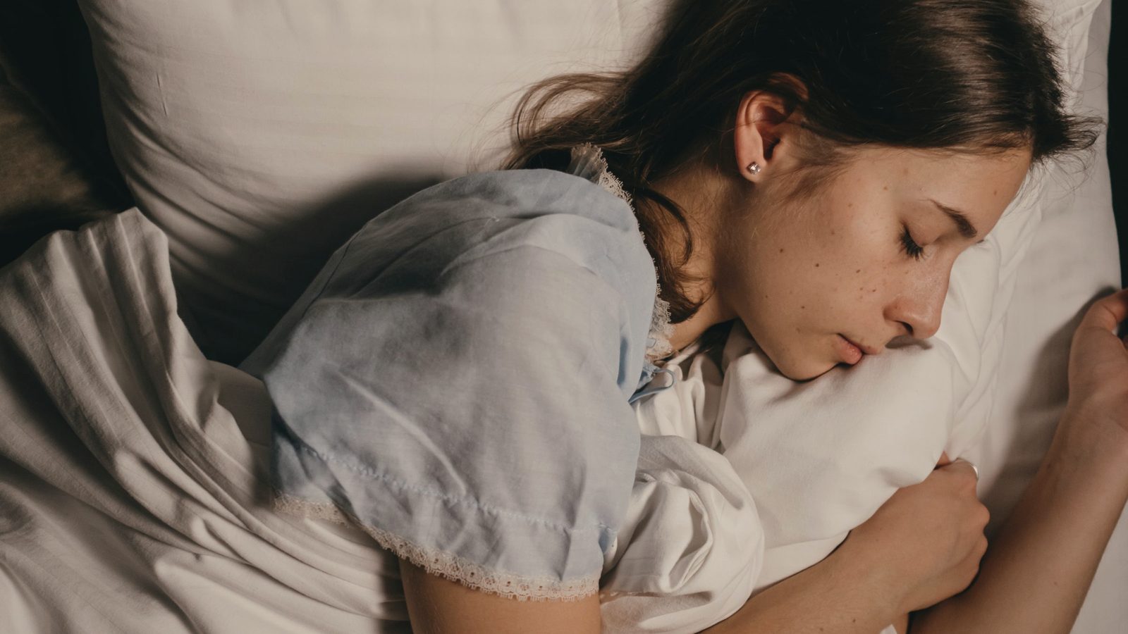 Woman sleeping in late