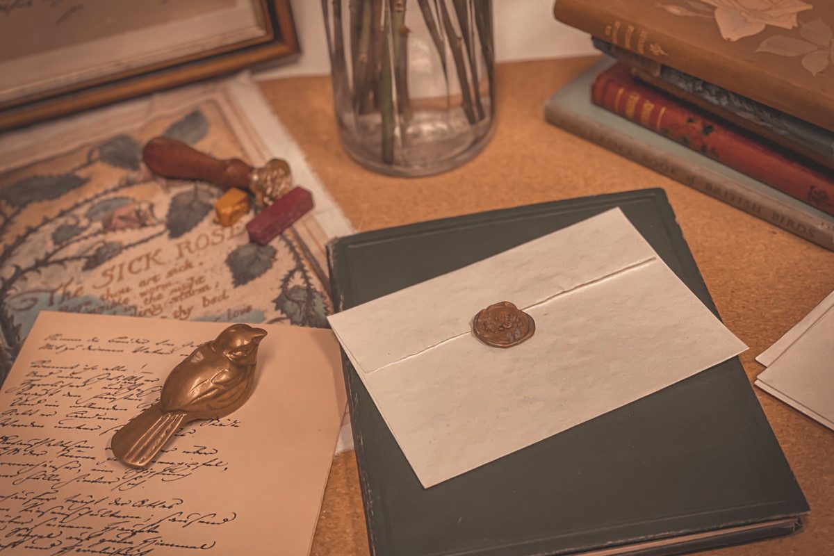 Handwritten letter and envelope sealed with wax