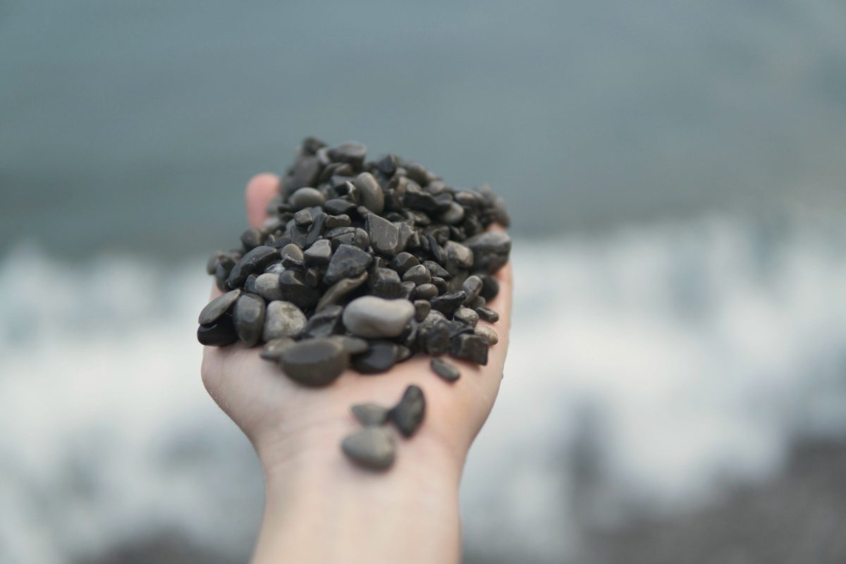 Person holding stones