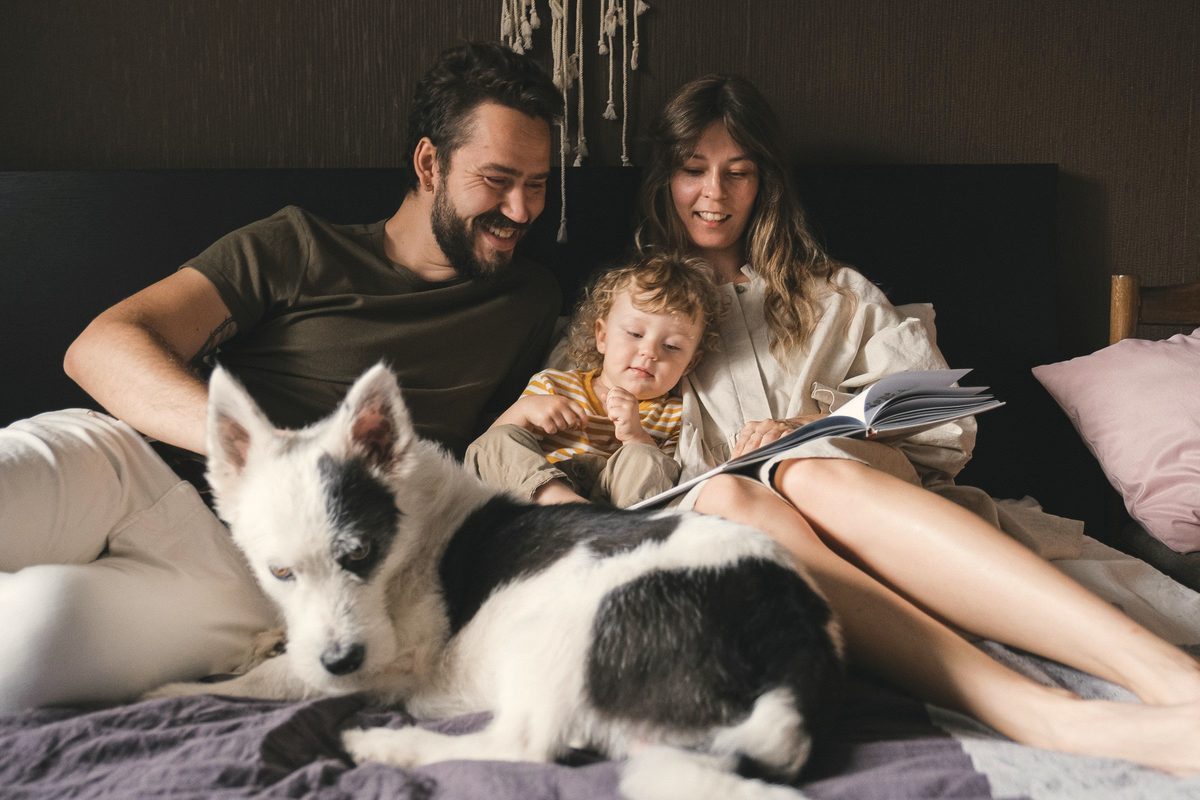 Family reading a book together