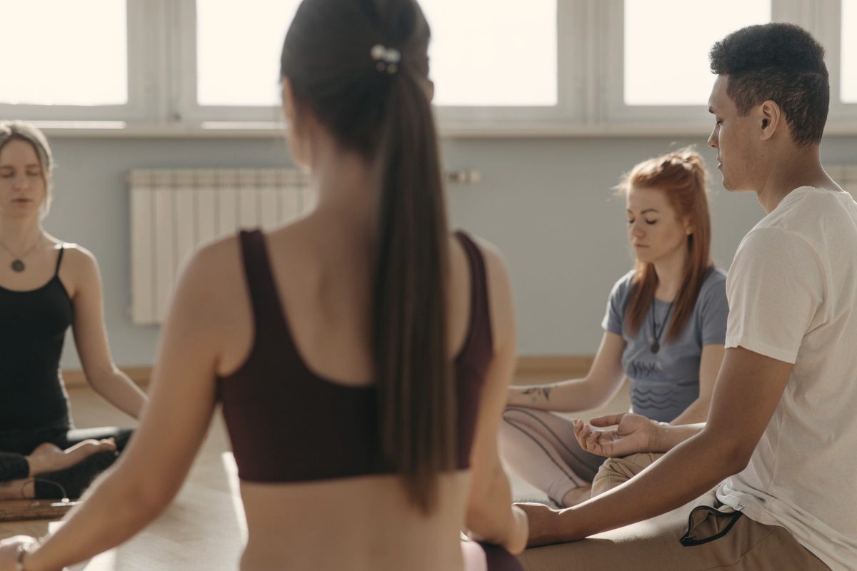 Group of people meditating together