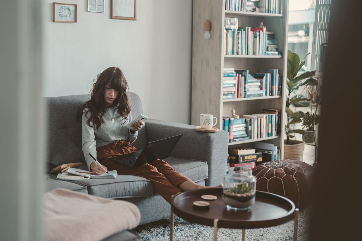 Woman sitting on couch