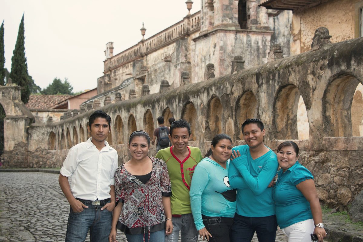 Smiling friends together in town