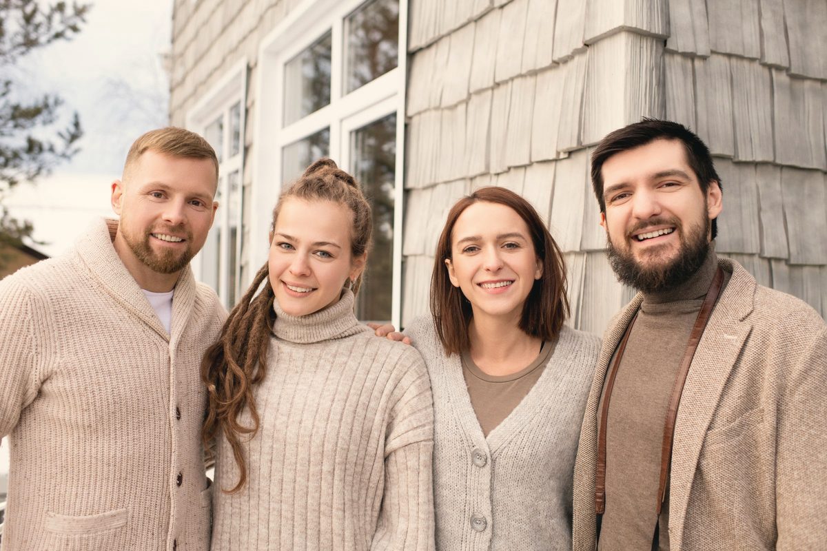 Group of smiling friends standing together