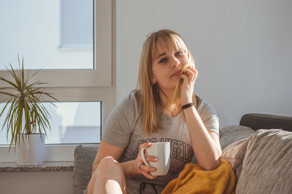 A woman relaxing on a couch
