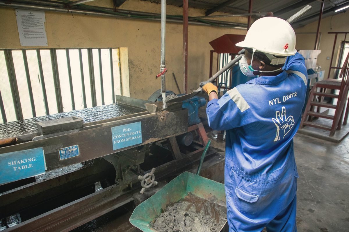 Worker in protective gear on an industrial shift