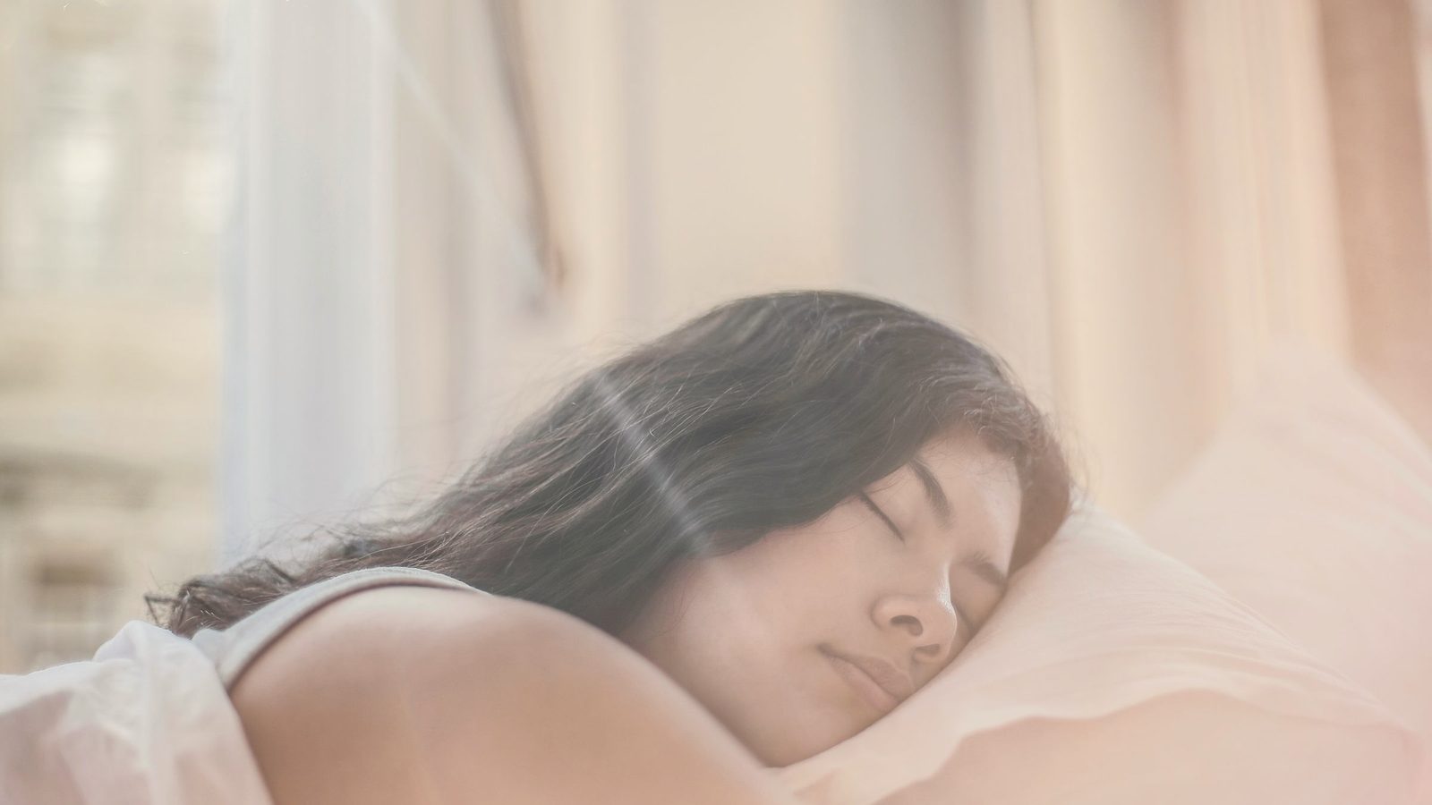 Woman sleeping peacefully in soft light