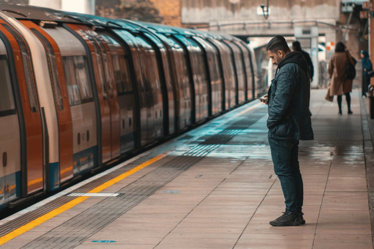 Man waiting on a train station