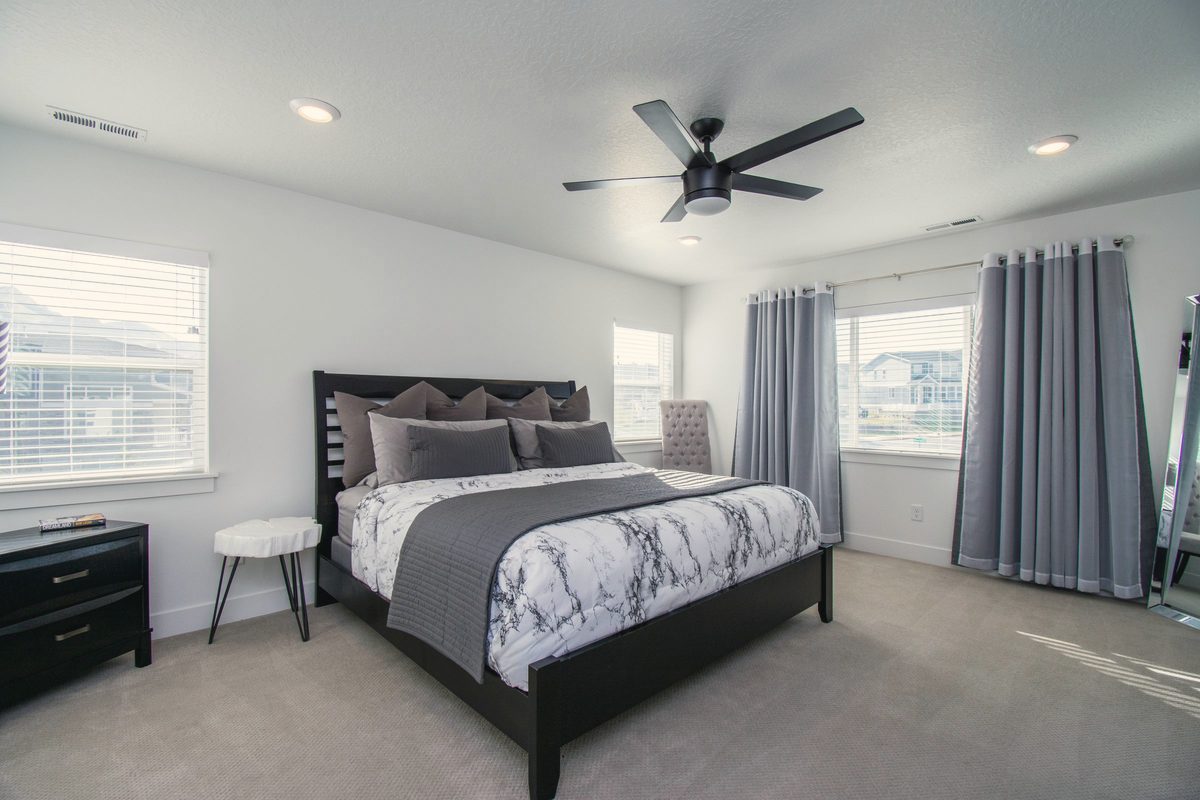 Clean, tidy bedroom with soft light
