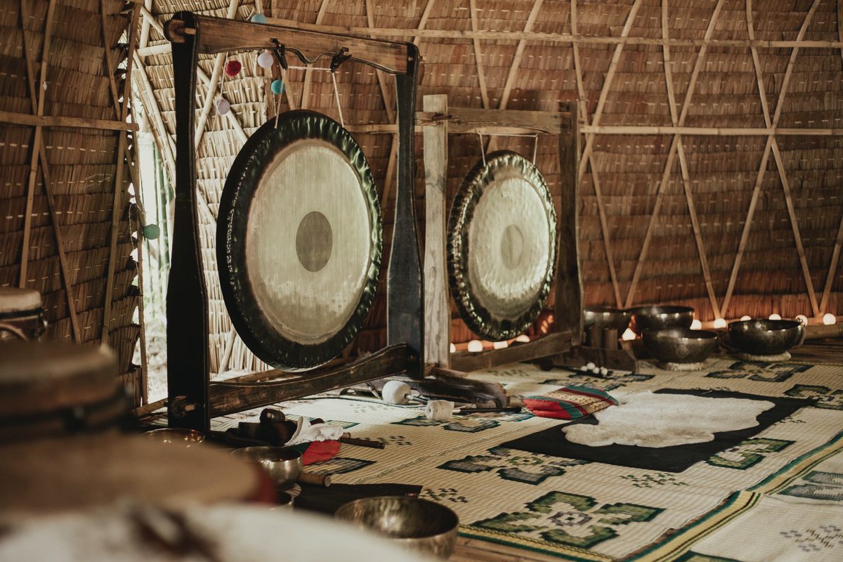 Room set up with gongs and singing bowls for a sound session