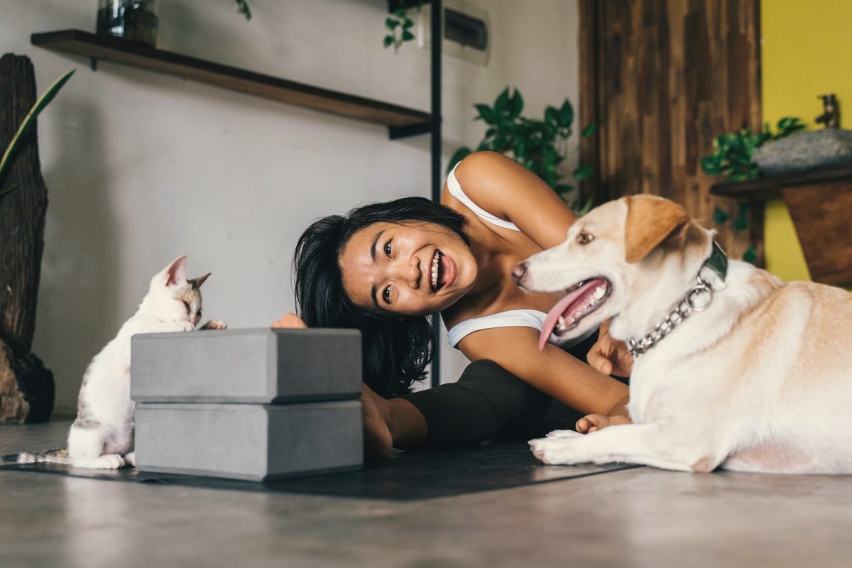 A woman doing yoga at home