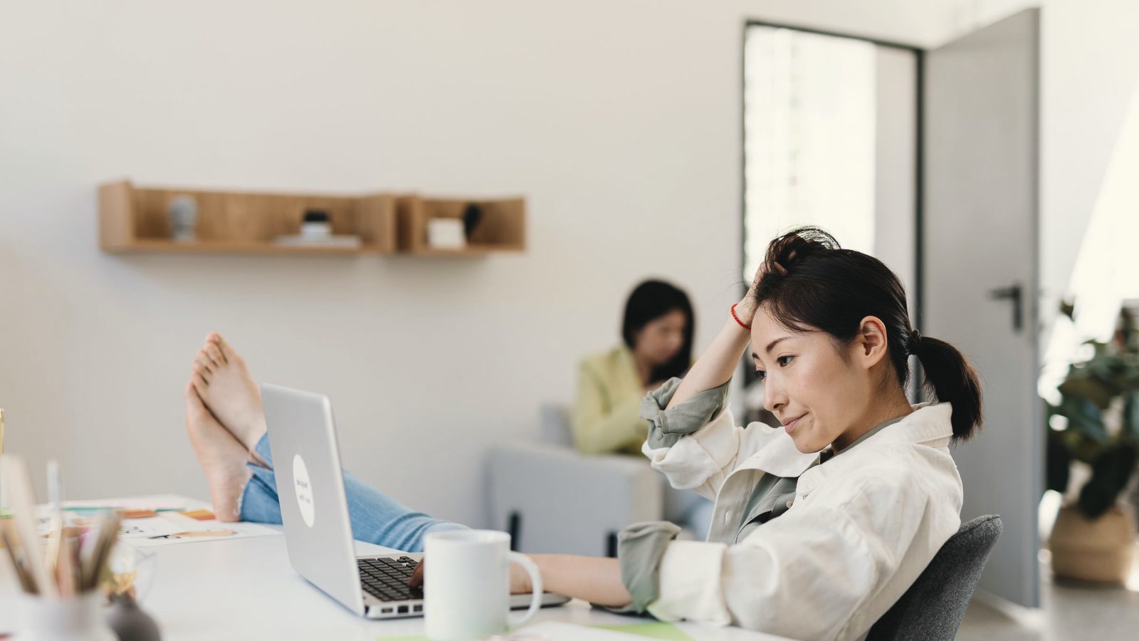 Stressed woman working on her laptop