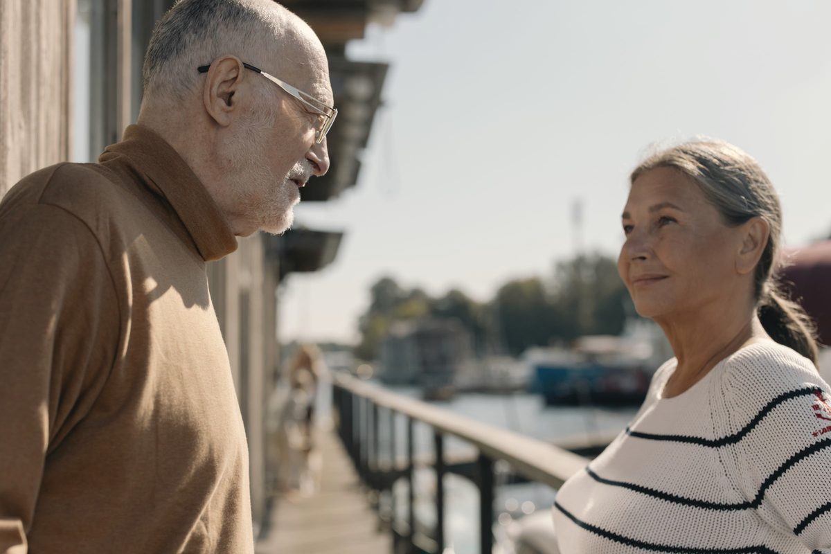 Older couple smiling at each other