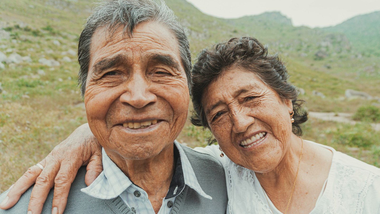 Smiling older couple outdoors