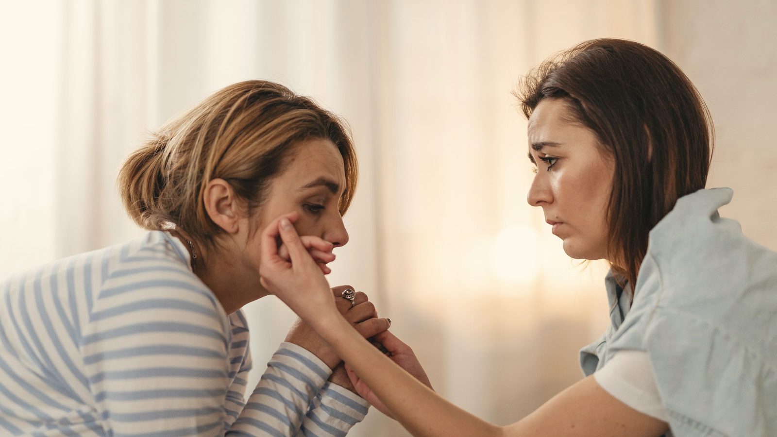Woman comforting an anxious friend