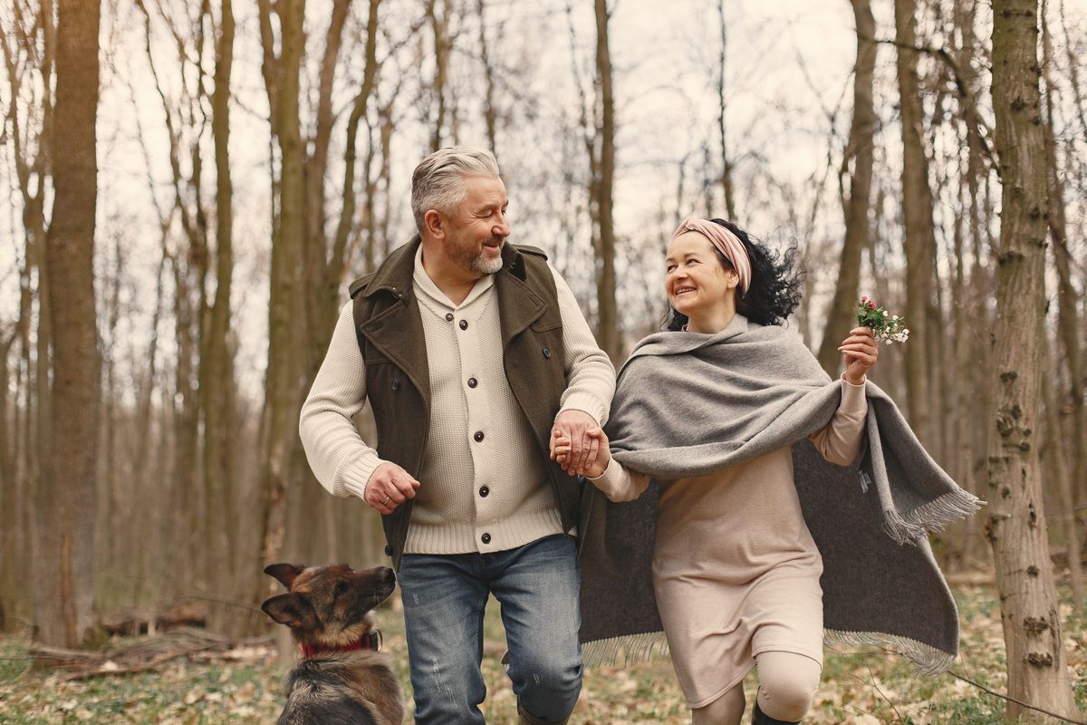 Man and woman looking at each other while smiling