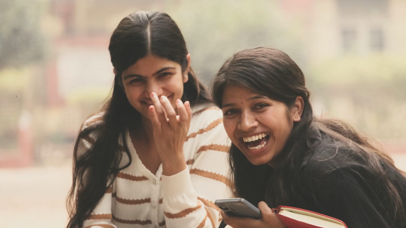 Smiling friends enjoying outdoor leisure
