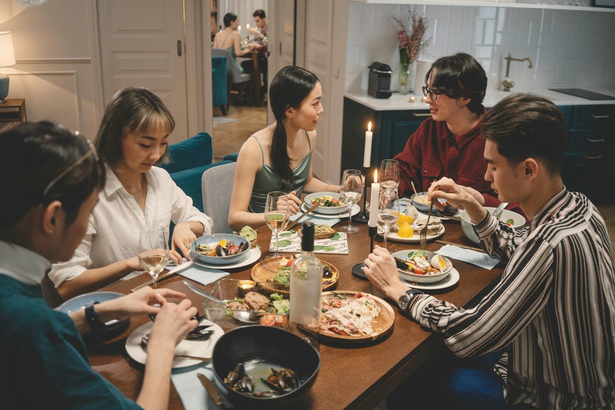 Friends having a good conversation over dinner