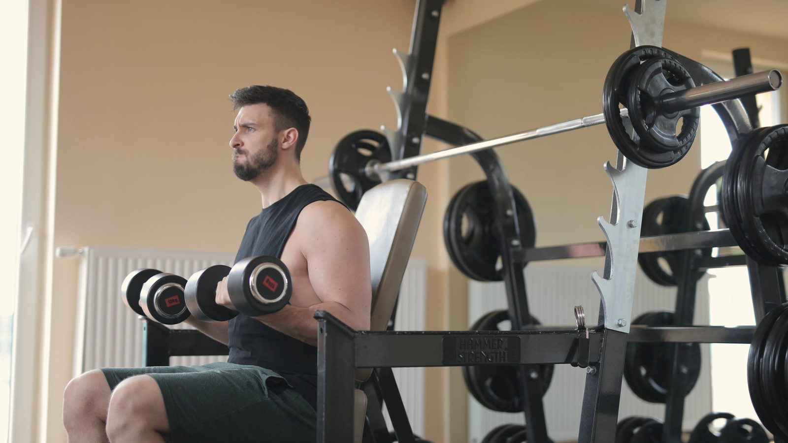 Man lifting dumbbells
