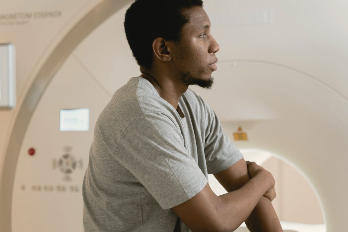 Man sitting quietly, lost in thought