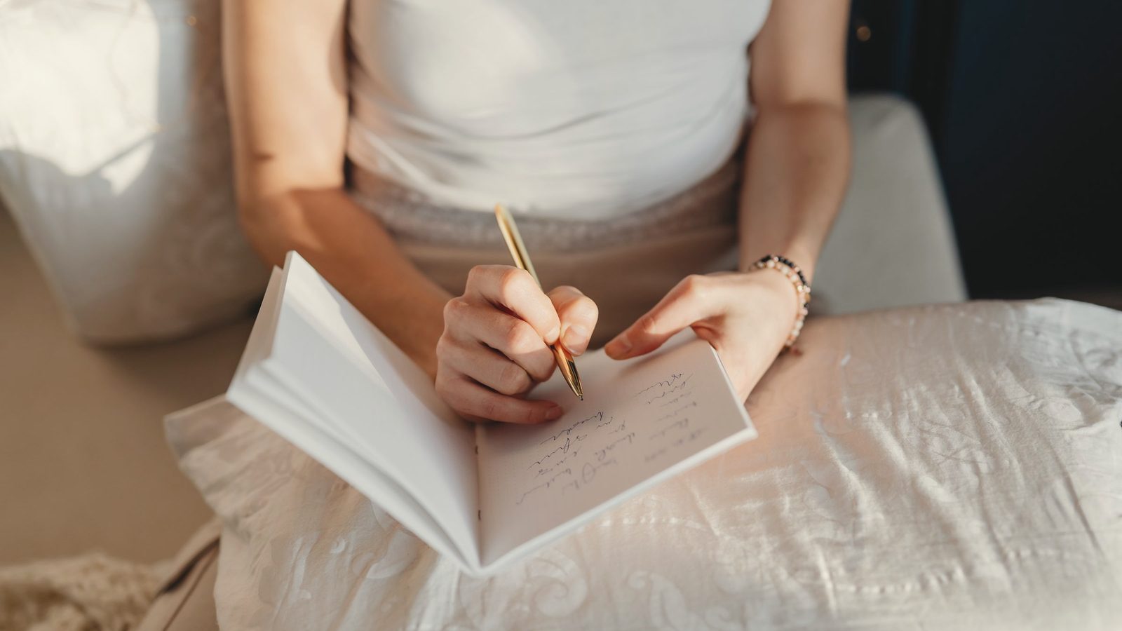 Woman writing on a notebook
