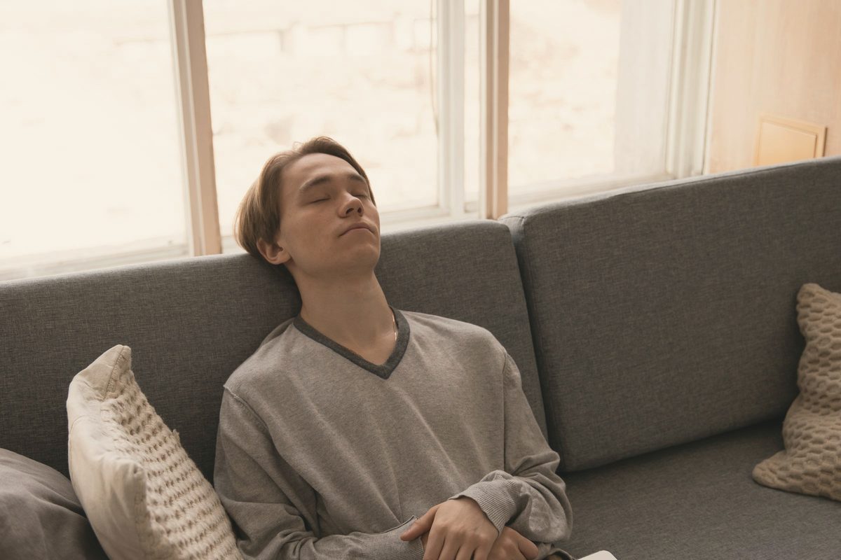 Man sleeping on couch