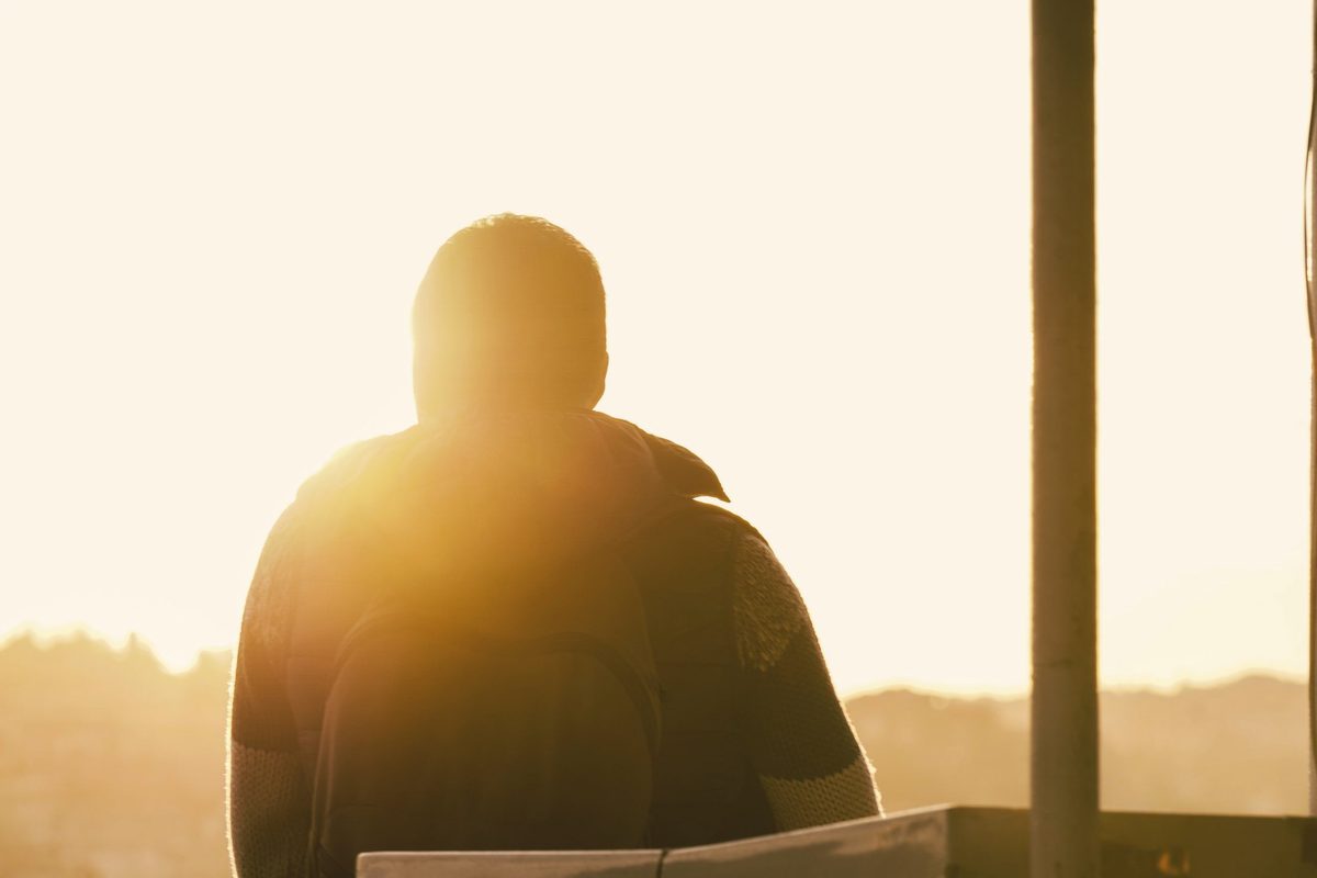 Man looking at the sunset