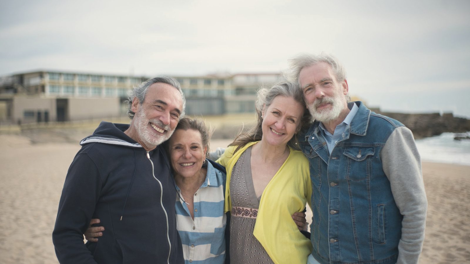 Group of older friends standing close together