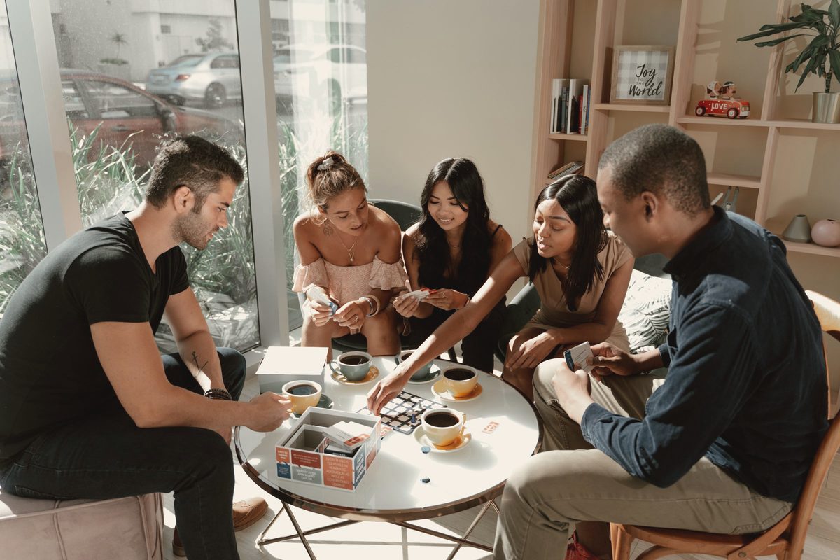 Group of friends talking at a cafe