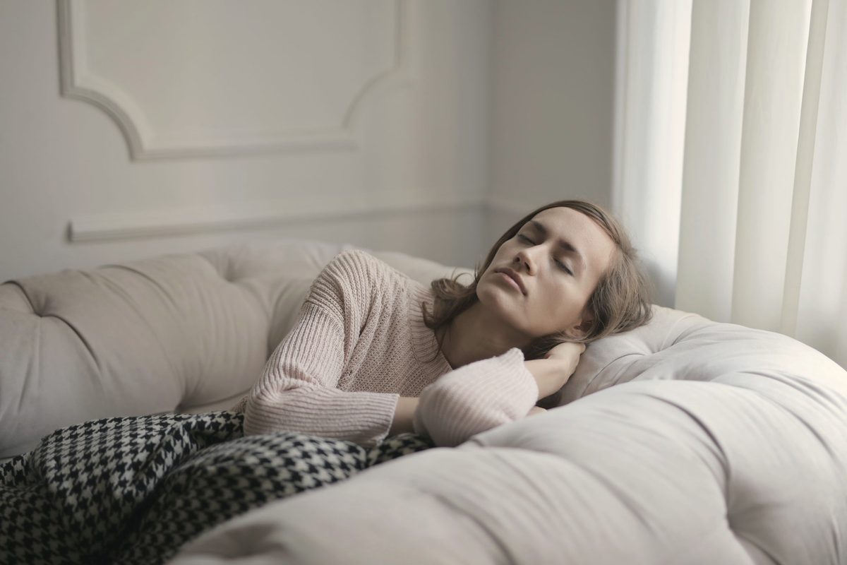 Woman resting on the sofa